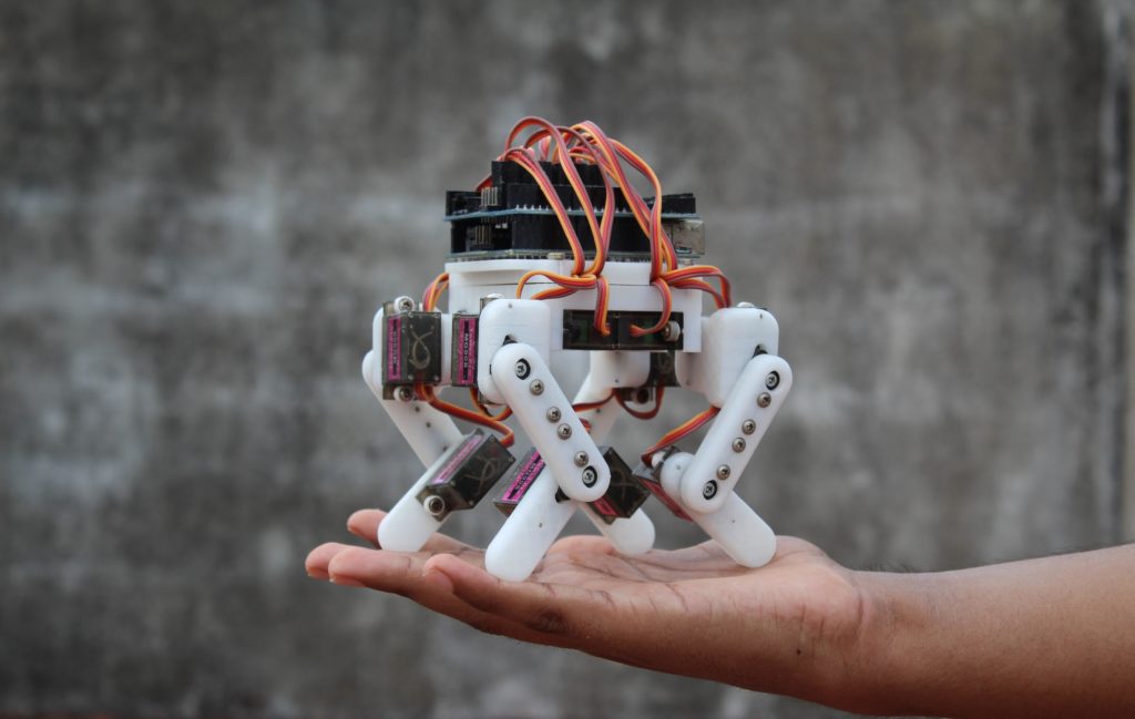 An Arduino-powered micro quadruped that fits in the palm of your hand