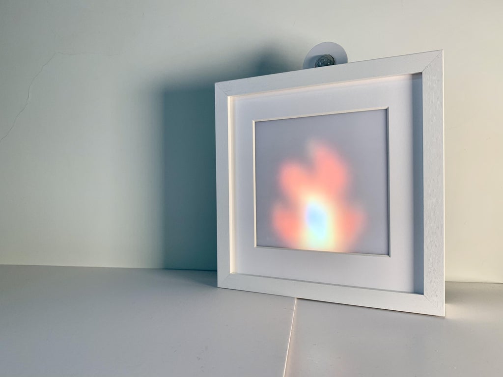 Living Pixels is a light frame that comes alive when you leave