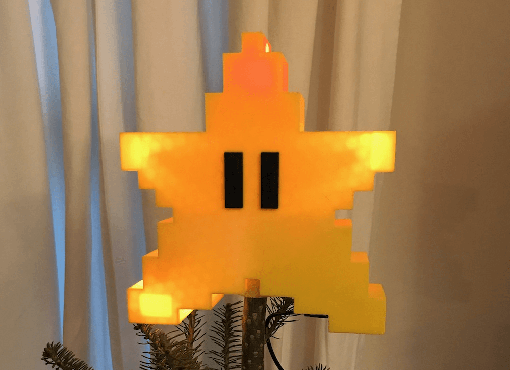 3D-printed Super Mario star twinkles atop the tree