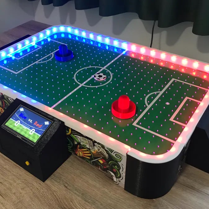 This home-made table puts a soccer spin on air hockey