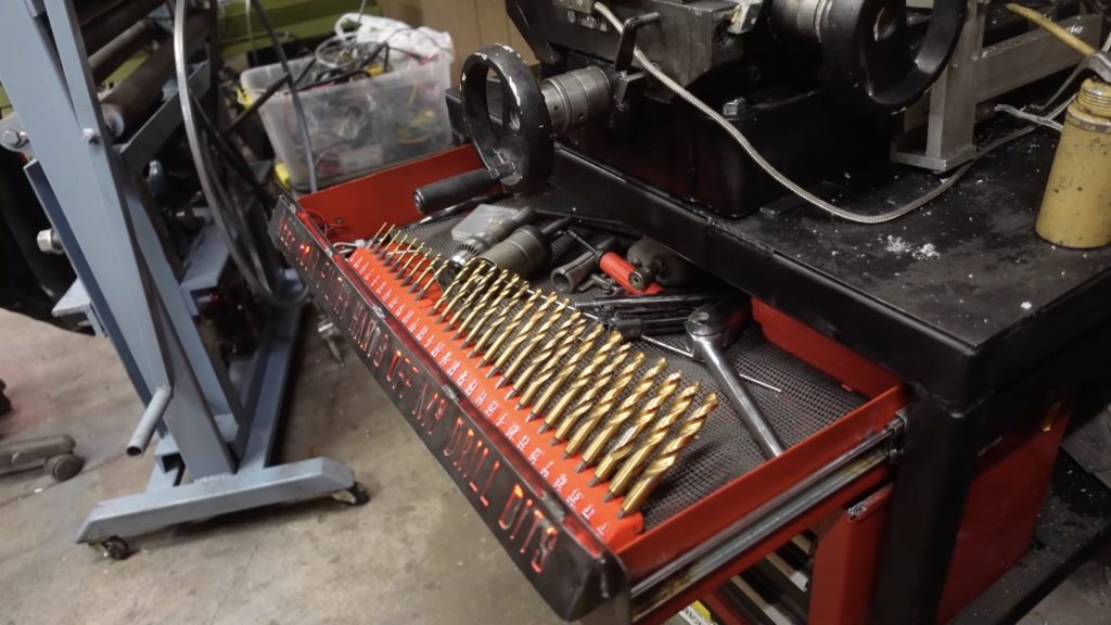 Custom machine stand yells at you if the drill bits aren’t stored properly