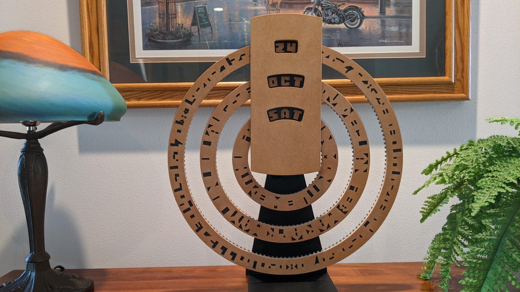 This perpetual calendar displays the date, month, and day using cryptic rings