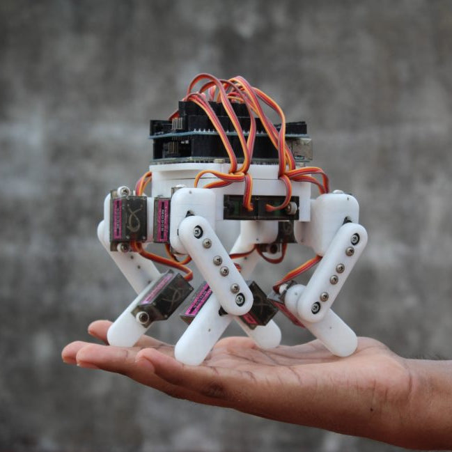 An Arduino-powered micro quadruped that fits in the palm of your hand
