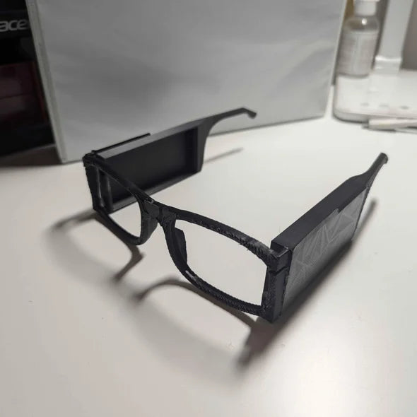 https://www.instructables.com/Smart-AI-Glasses-for-Blind-to-Transcribe-Text-to-A/