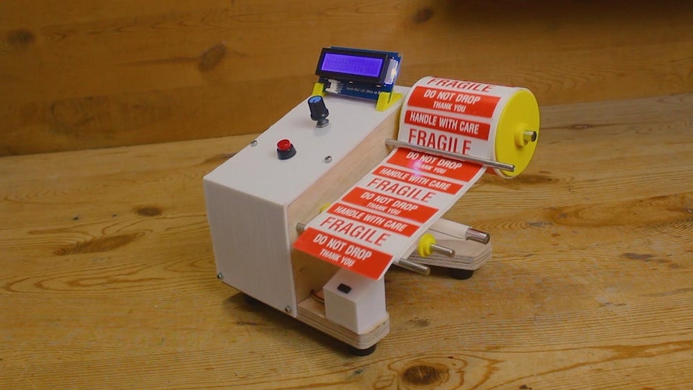 This machine dispenses labels, making it easier to peel them off