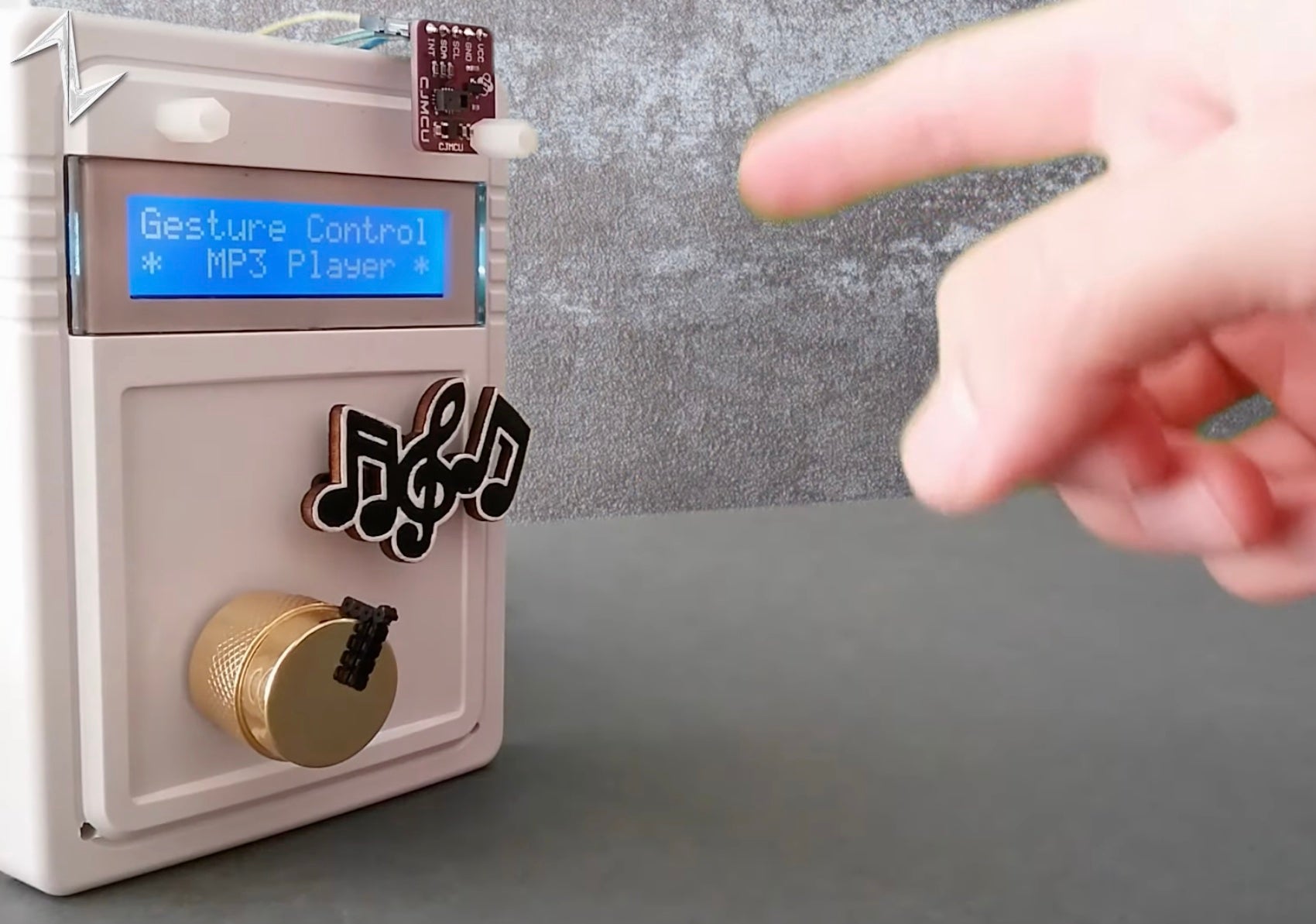 This MP3 player is controlled with a twirl of your finger and wave of your hand