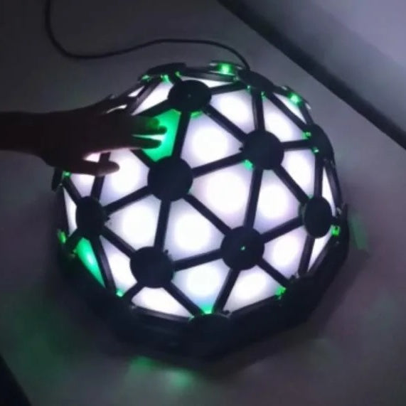 Play Simon and the piano on this glowing geodesic dome