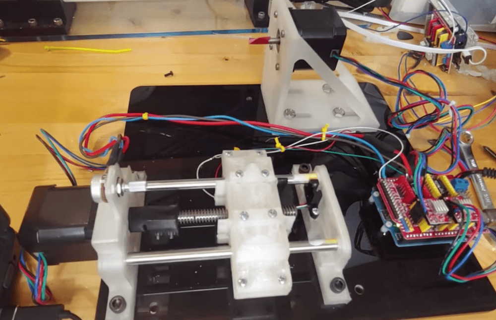 Use an Arduino and a pair of stepper motors to automatically wind pickups