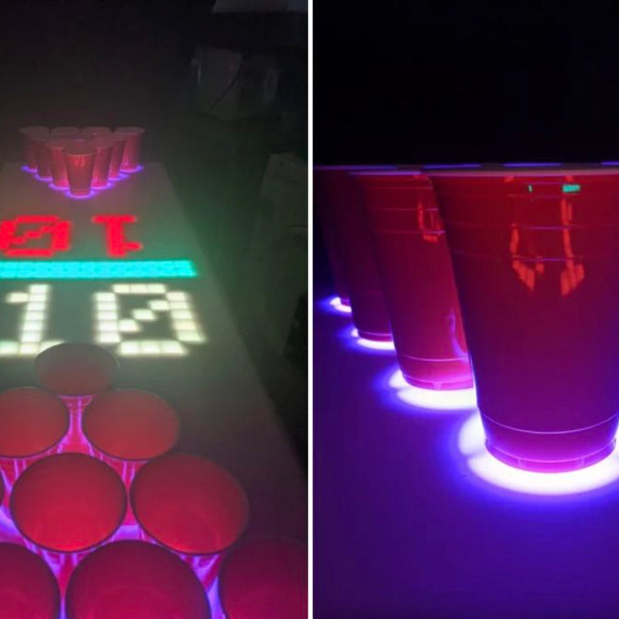 This interactive beer pong table is lit, literally