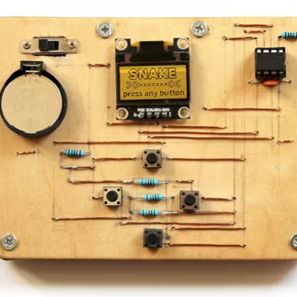 Cultsauce's Wooden Handheld Console Hides Your Soldering Horrors in a Plywood-Cork Sandwich