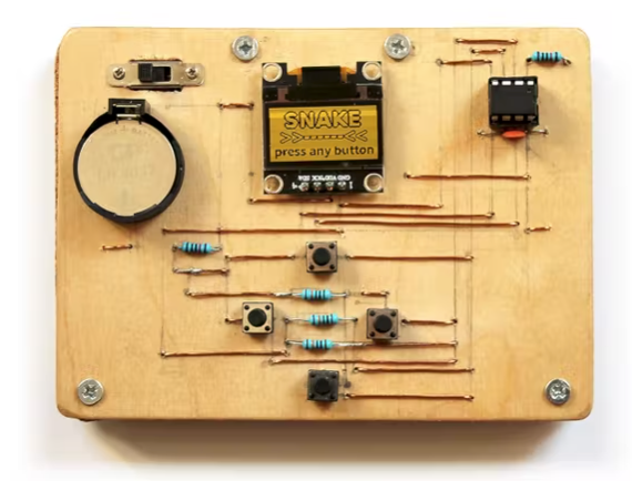Cultsauce's Wooden Handheld Console Hides Your Soldering Horrors in a Plywood-Cork Sandwich