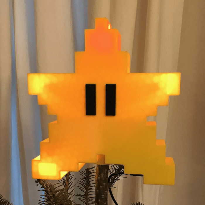 3D-printed Super Mario star twinkles atop the tree