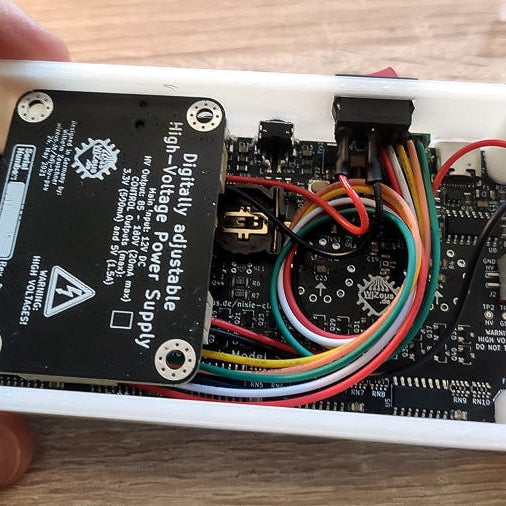 Wilhelm Zeuschner's All-in-One Programmable PSU Aims to Make Building Nixie Clocks a Lot Easier