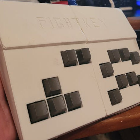 This Raspberry Pi Pico-Powered "Fight Key" Packs a Keyboard-Style Punch for Arcade Fighting Games