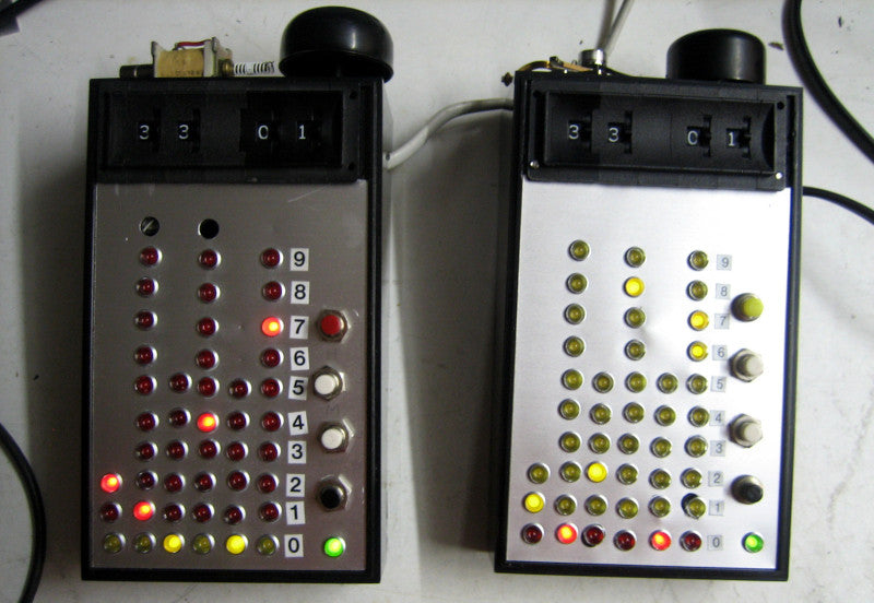 Build a clock using logic ICs, lots of LEDs and a loud bell