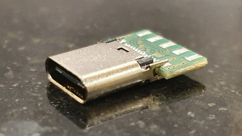 Learn how an enthusiast hacked a USB-C socket into their older 2011 MacBook Pro