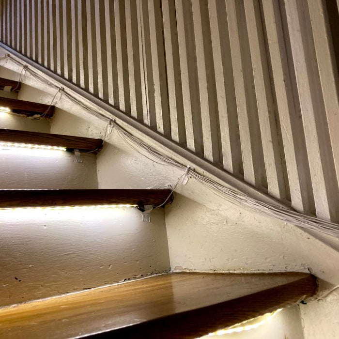 Cascading LED stair lights prevent late night tumbles — and put on a show during parties