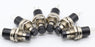 Momentary Mini Pushbutton - Black cap in packs of ten from PMD Way with free delivery worldwide